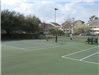 Group of People Playing Tennis